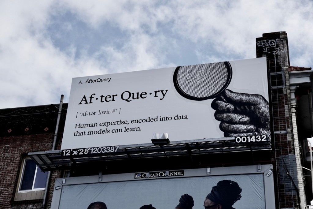 AfterQuery outdoor billboard with a magnifying glass and the line Human expertise, encoded into data that models can learn